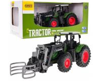 Zöld traktor markolóval