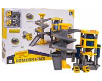 Építési telek silóval, csúszdákkal és autókkal