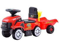 Piros színű traktor pótkocsival